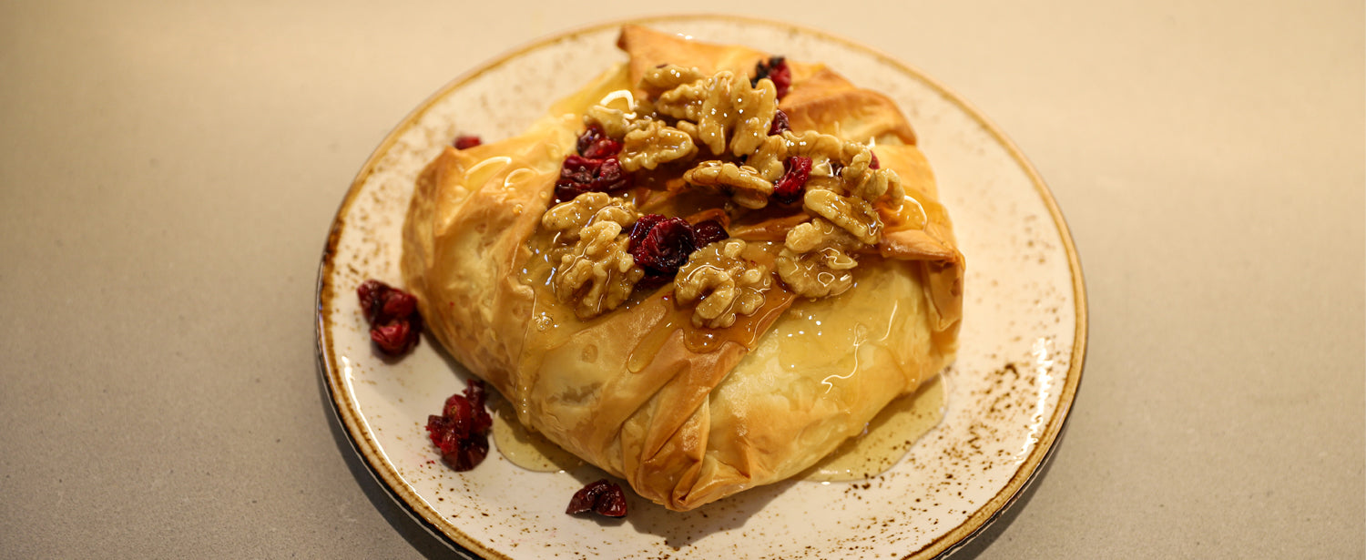 Phyllo Baked Brie with Nutty Honey
